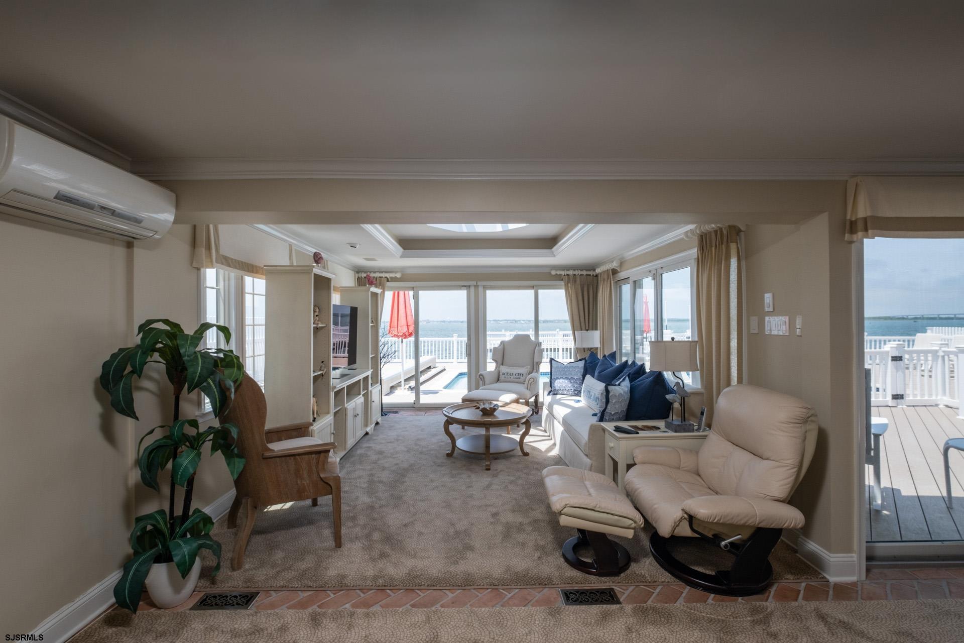 232 Bay Road Ocean City, NJ 08226 - Photo 9 of 32 a living room with furniture and a potted plant