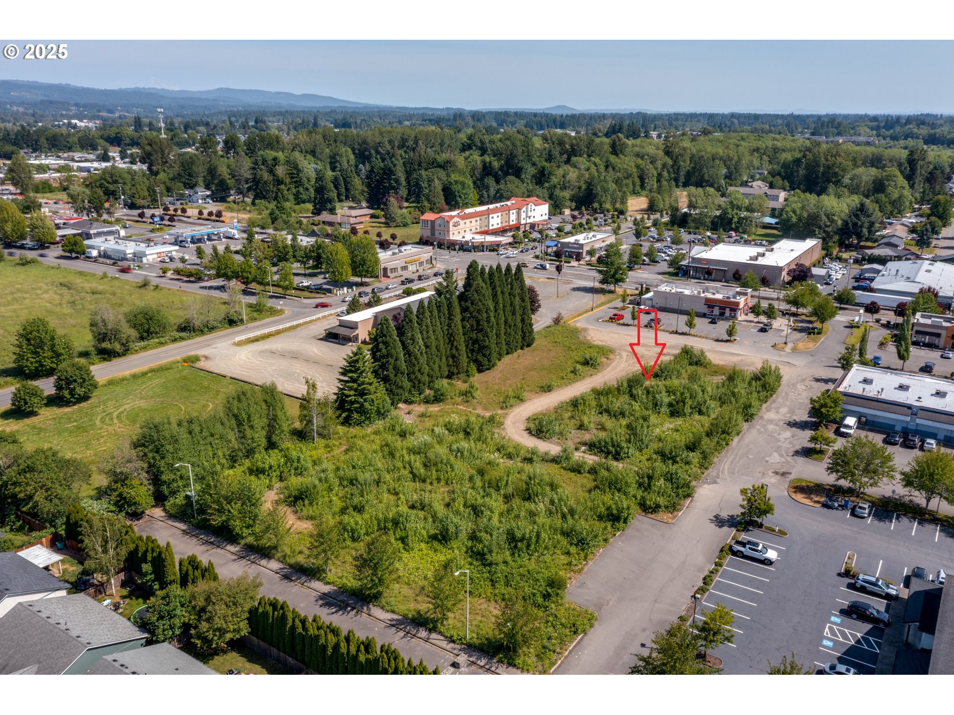 0 Northwest 2nd Street, Unit 2 Battle Ground, WA 98604 - Photo 11 of 11 a view of a houses with a yard and lake view