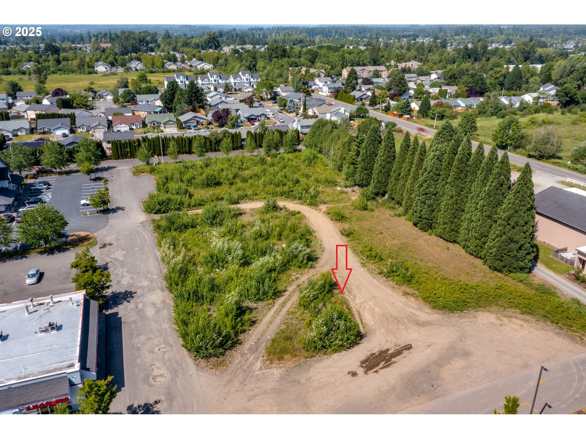 0 Northwest 2nd Street, Unit 2 Battle Ground, WA 98604 - Photo 5 of 11 an aerial view of residential houses with outdoor space