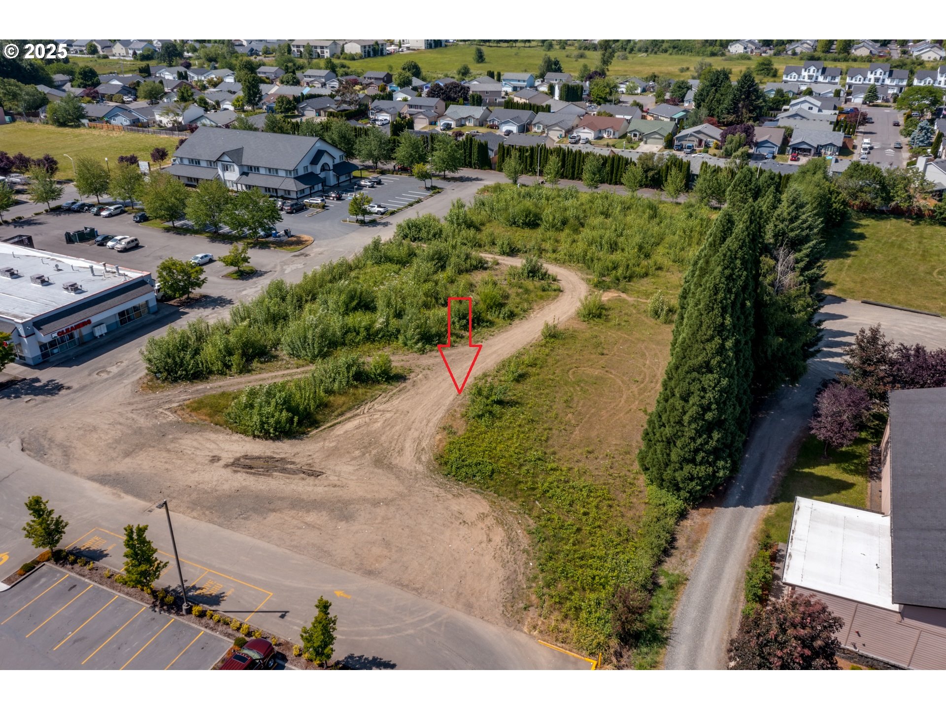 0 Northwest 2nd Street, Unit 2 Battle Ground, WA 98604 - Photo 7 of 11 an aerial view of residential houses with outdoor space