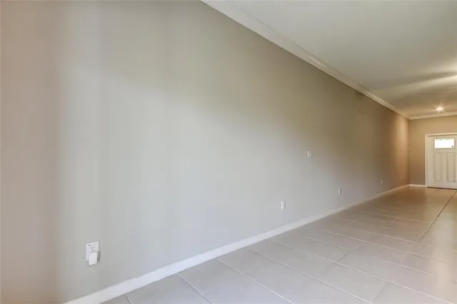 a kitchen with stainless steel appliances kitchen island granite countertop a refrigerator stove and oven