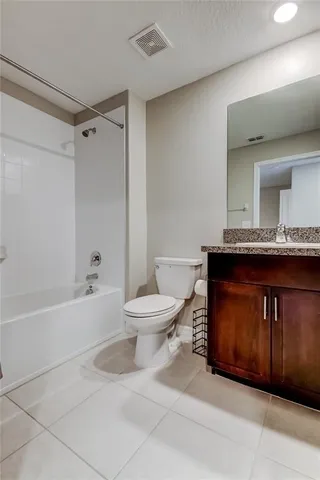 an empty room with a bathroom