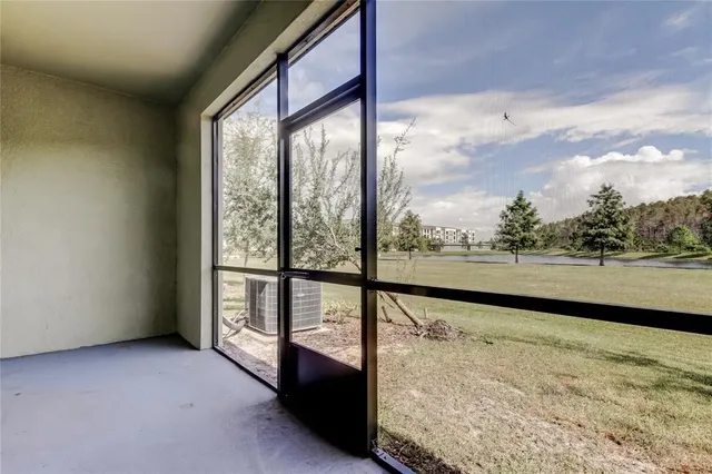 a view of a playground with basketball court