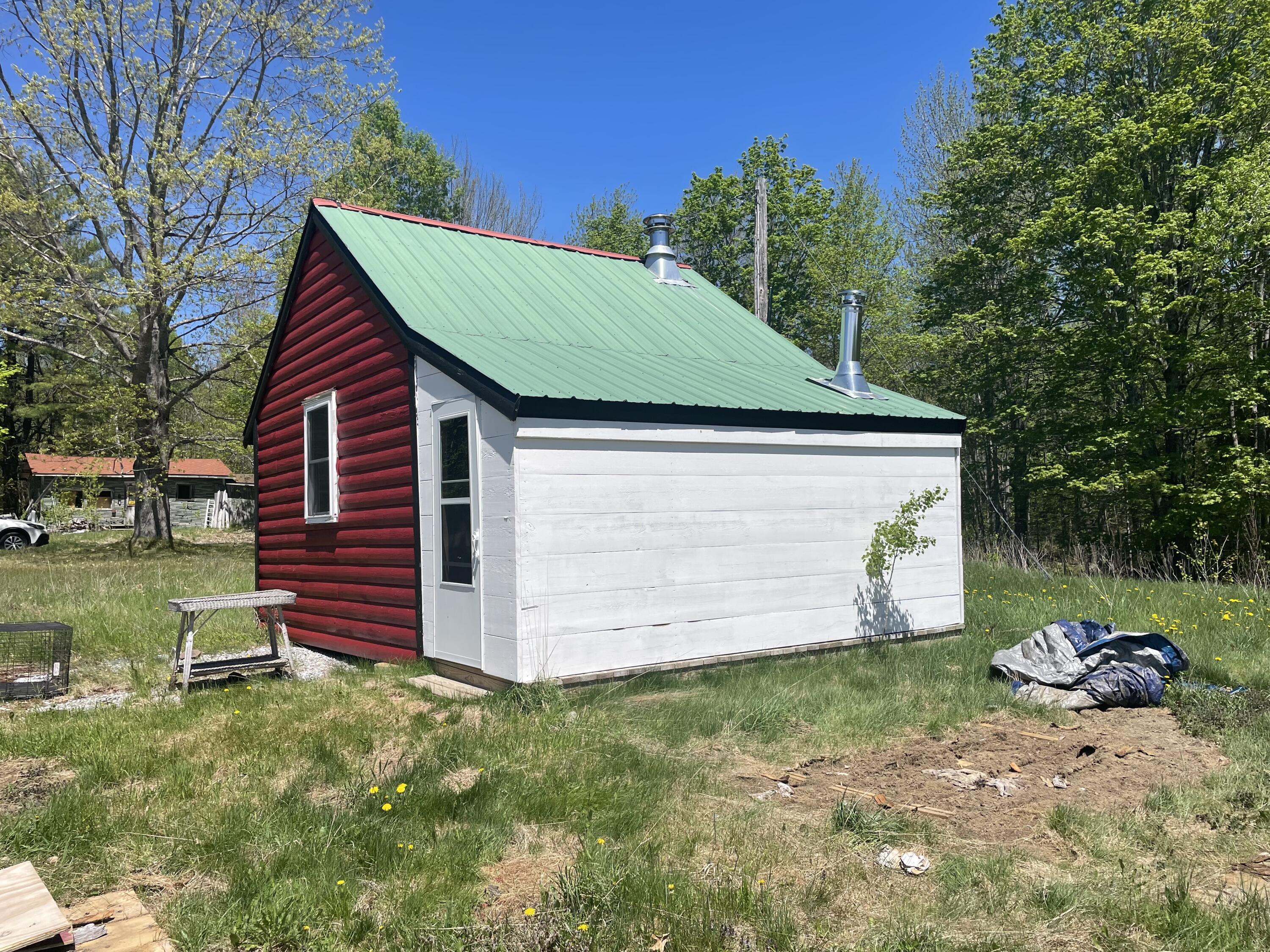43 Baker Road Burlington, ME 04417 - Photo 5 of 12 Hattabaugh Cabin Pic