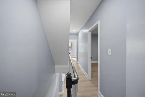 a view of hallway with stairs