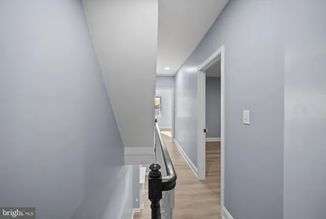 a view of hallway with stairs