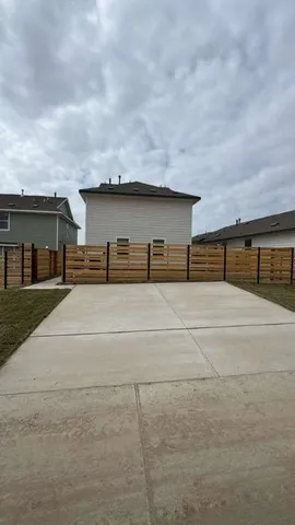 a front view of a house with garage