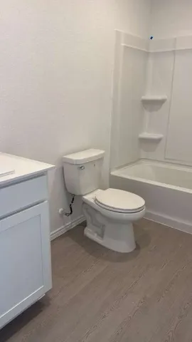 a view of hallway with washer and dryer