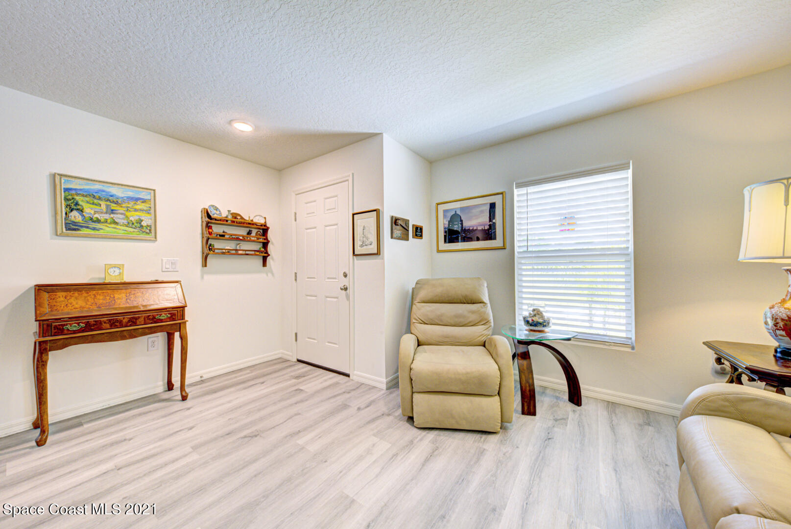 999 Commerce Road Southeast Palm Bay, FL 32909 - Photo 12 of 48 living room & foyer
