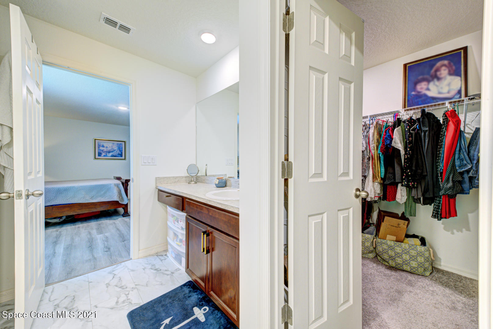 999 Commerce Road Southeast Palm Bay, FL 32909 - Photo 28 of 48 master bathroom & walk-in closet