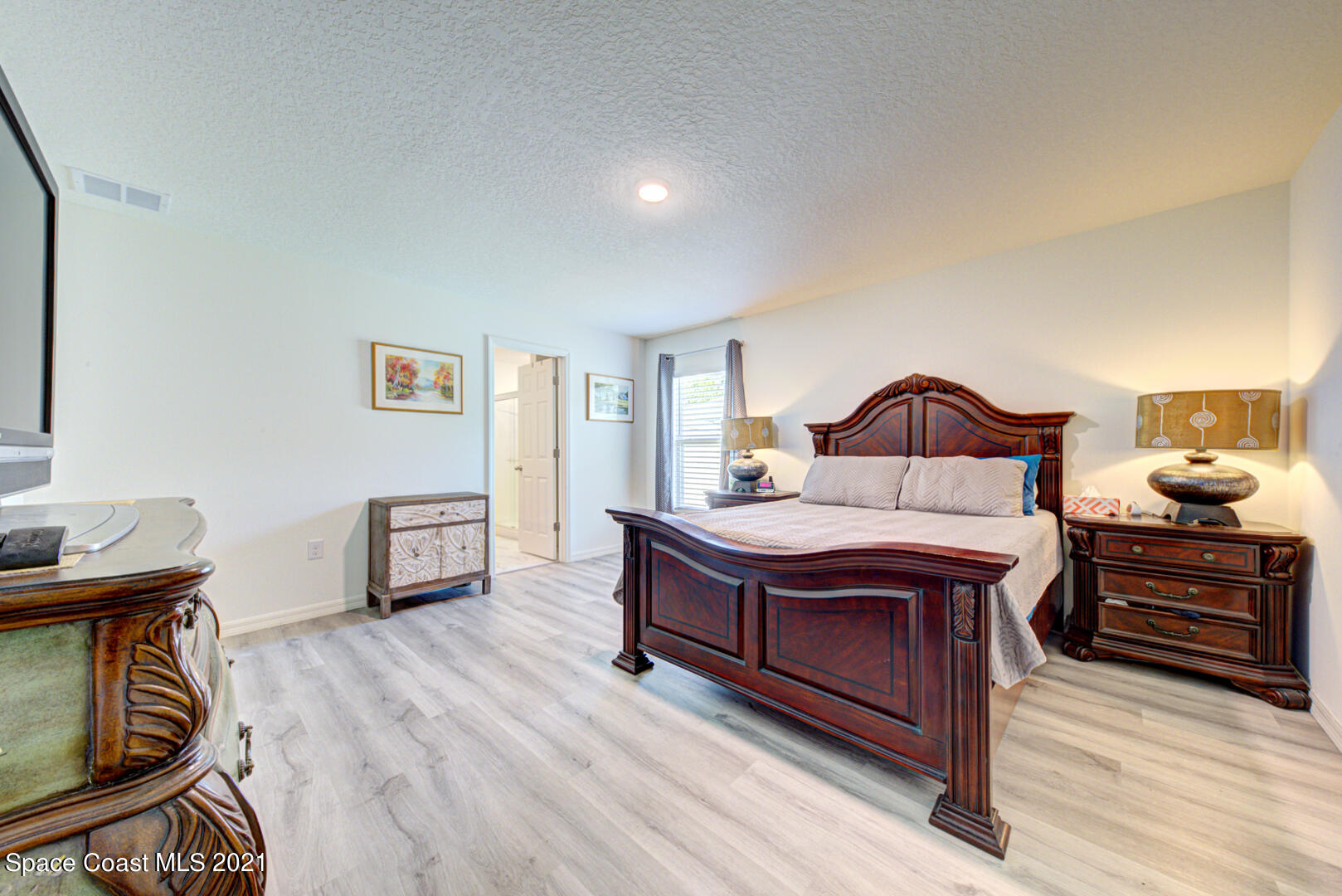999 Commerce Road Southeast Palm Bay, FL 32909 - Photo 32 of 48 master bedroom view from door