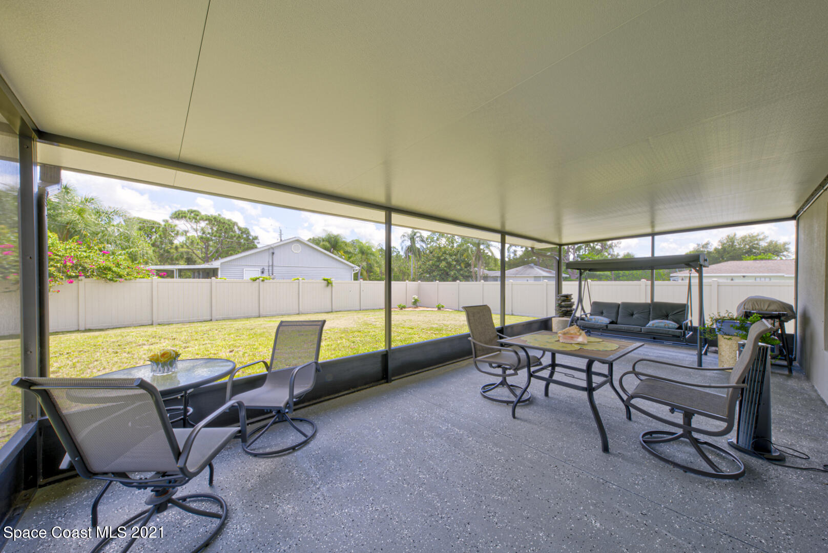 999 Commerce Road Southeast Palm Bay, FL 32909 - Photo 44 of 48 screened-in back porch