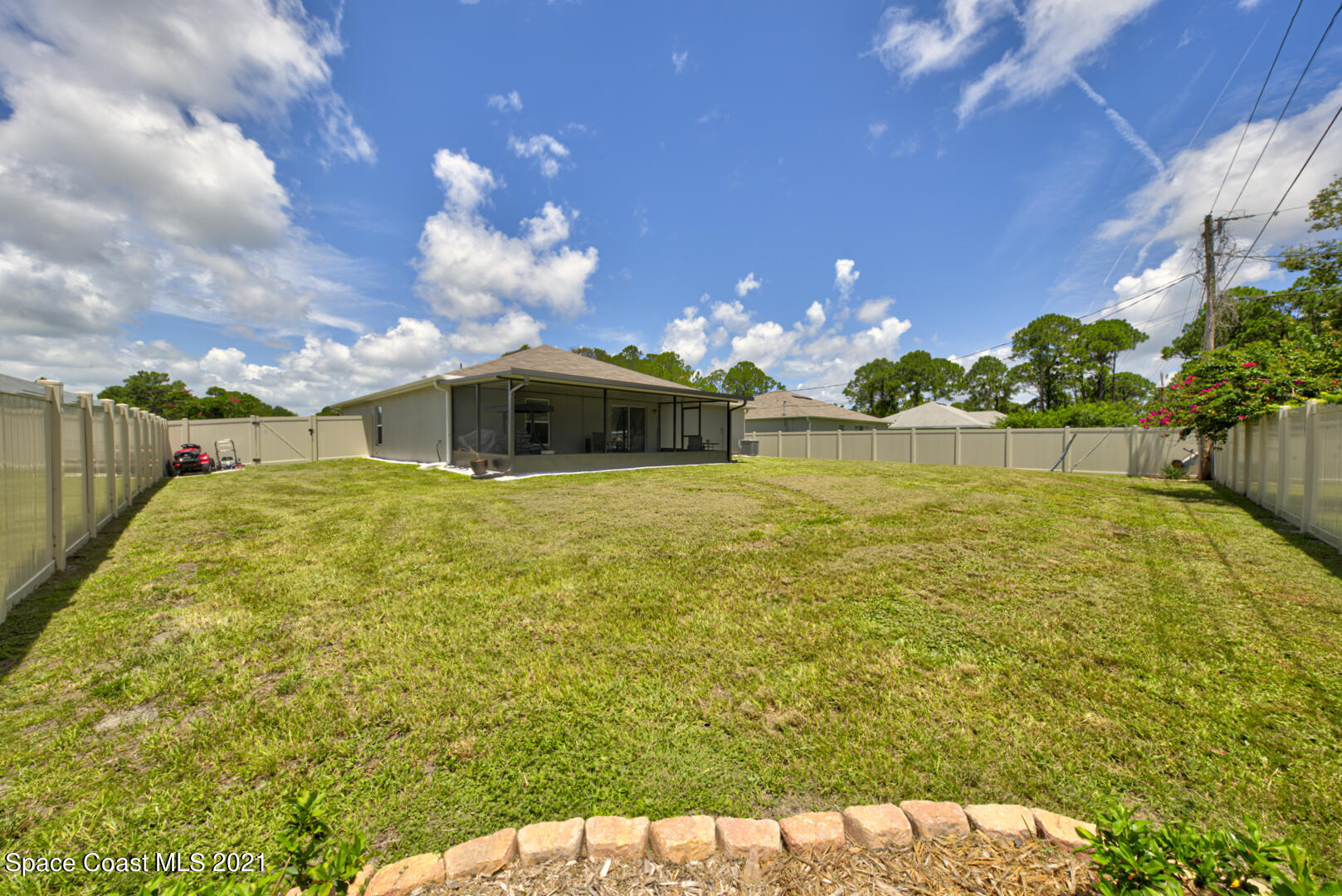 999 Commerce Road Southeast Palm Bay, FL 32909 - Photo 45 of 48 back of house left