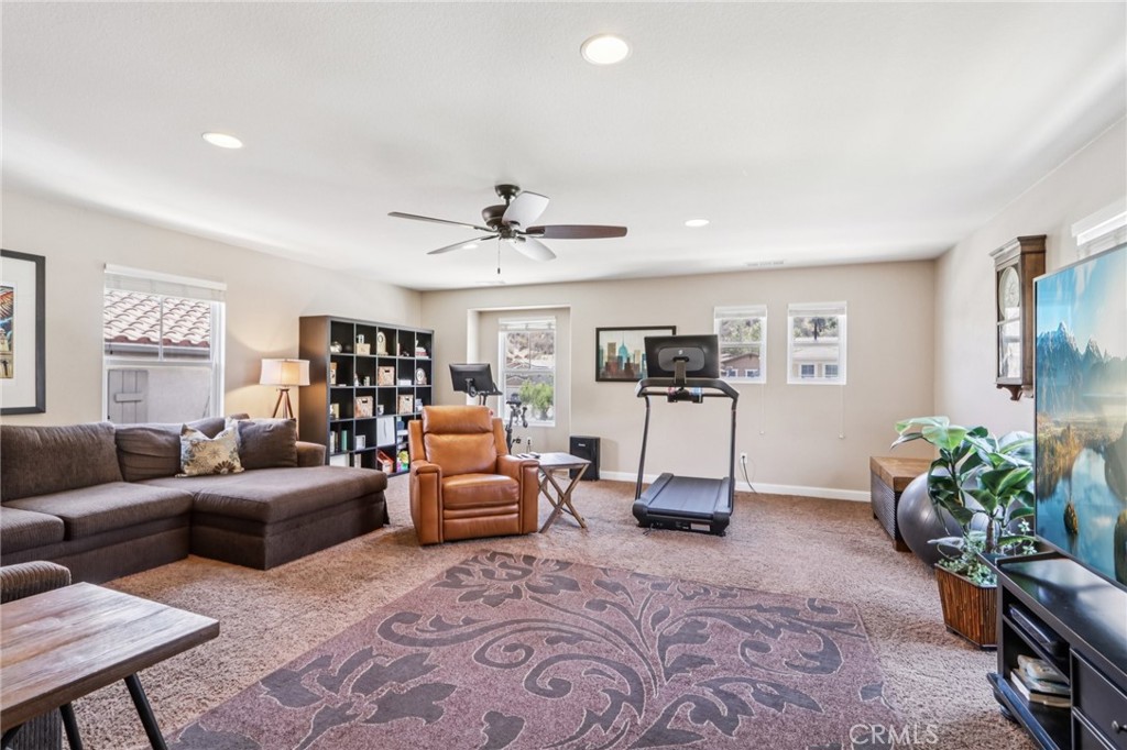 19941 Christopher Lane Saugus, CA 91350 - Photo 13 of 34 a living room with furniture and a table