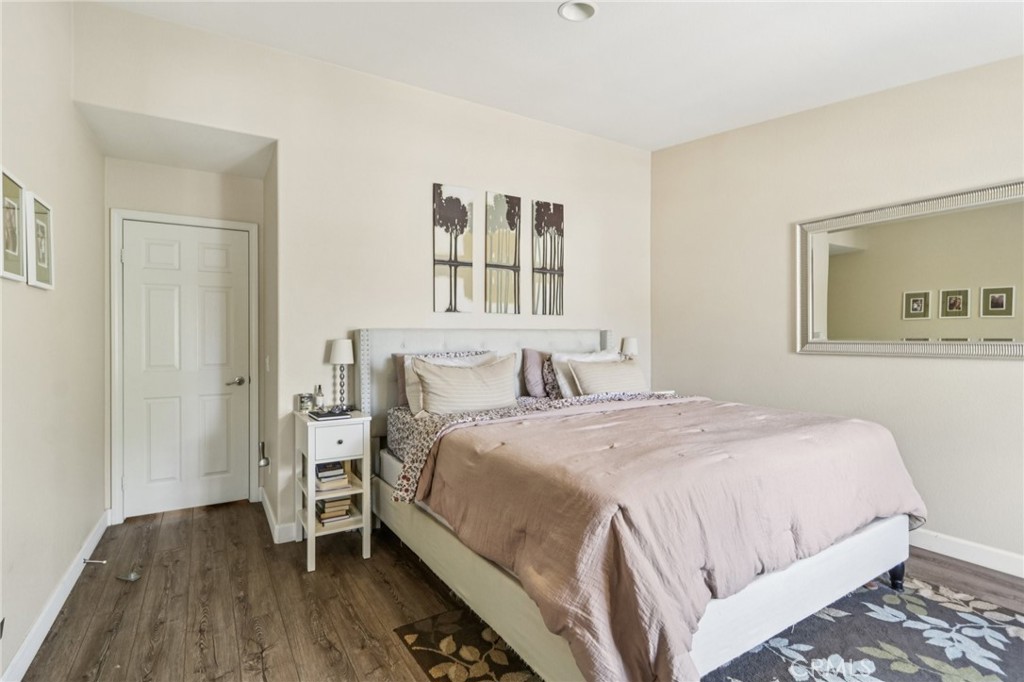 19941 Christopher Lane Saugus, CA 91350 - Photo 21 of 34 a bedroom with a bed and a window