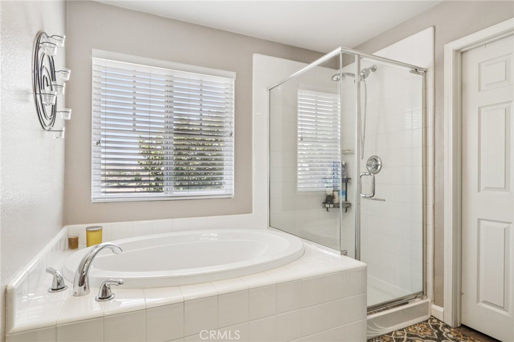 19941 Christopher Lane Saugus, CA 91350 - Photo 23 of 34 a white bath tub sitting next to a window