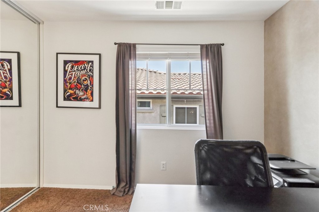 19941 Christopher Lane Saugus, CA 91350 - Photo 29 of 34 a living room with furniture and a window