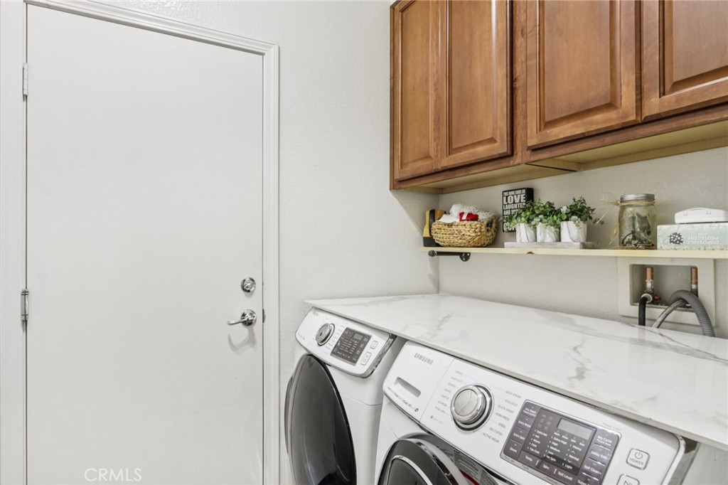 19941 Christopher Lane Saugus, CA 91350 - Photo 30 of 34 a utility room with dryer and washer