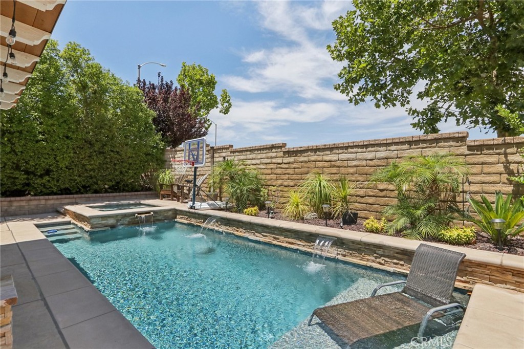 19941 Christopher Lane Saugus, CA 91350 - Photo 3 of 34 a view of swimming pool with chairs