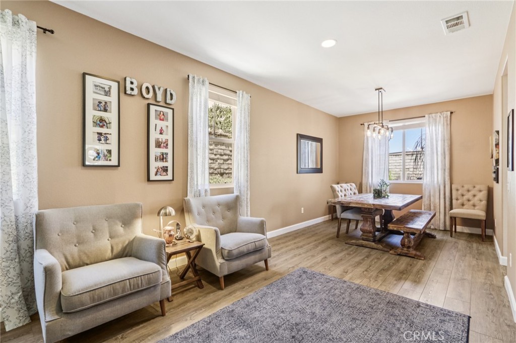 19941 Christopher Lane Saugus, CA 91350 - Photo 6 of 34 a living room with furniture and a large window