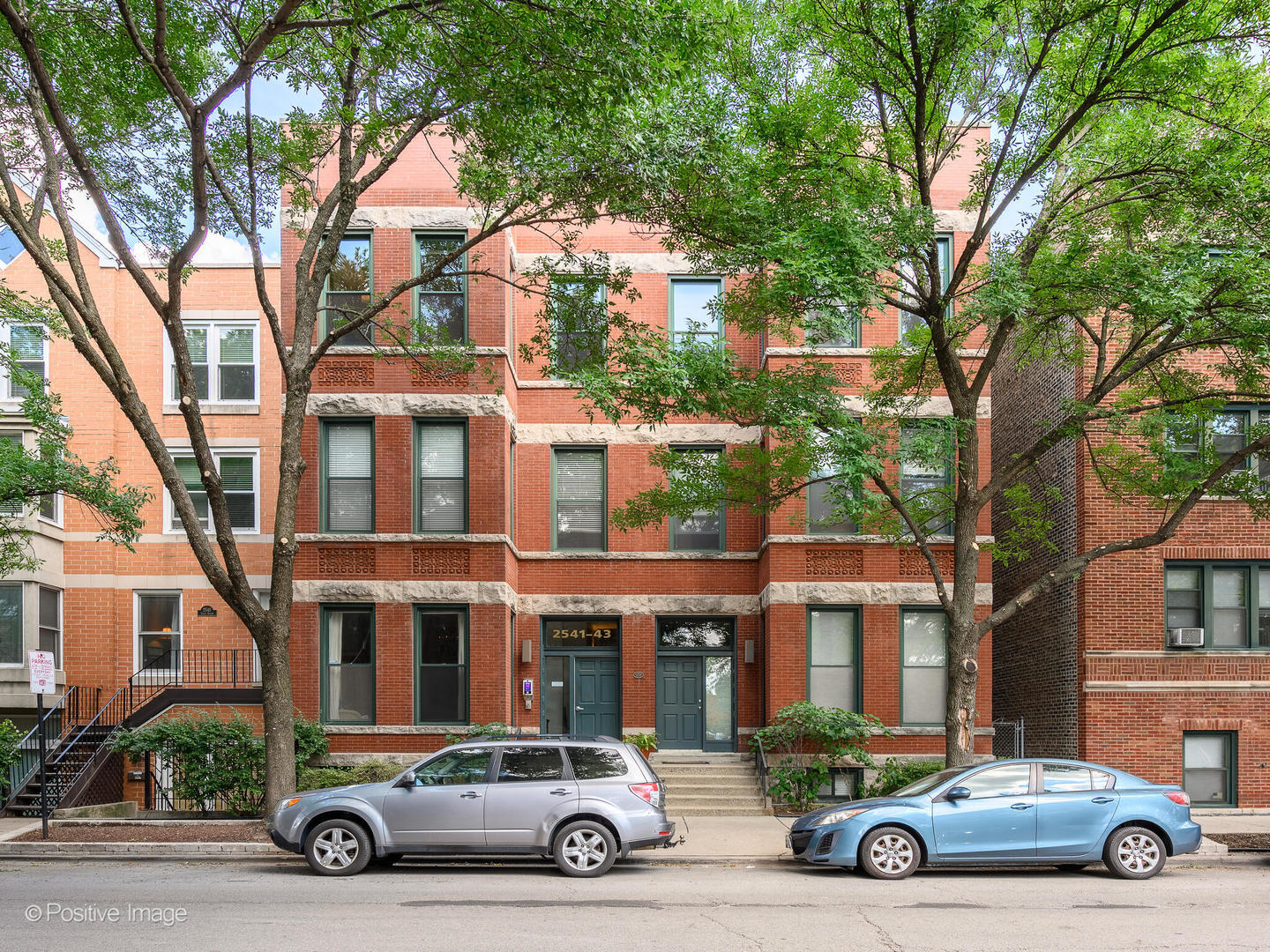 a car parked in front of a building