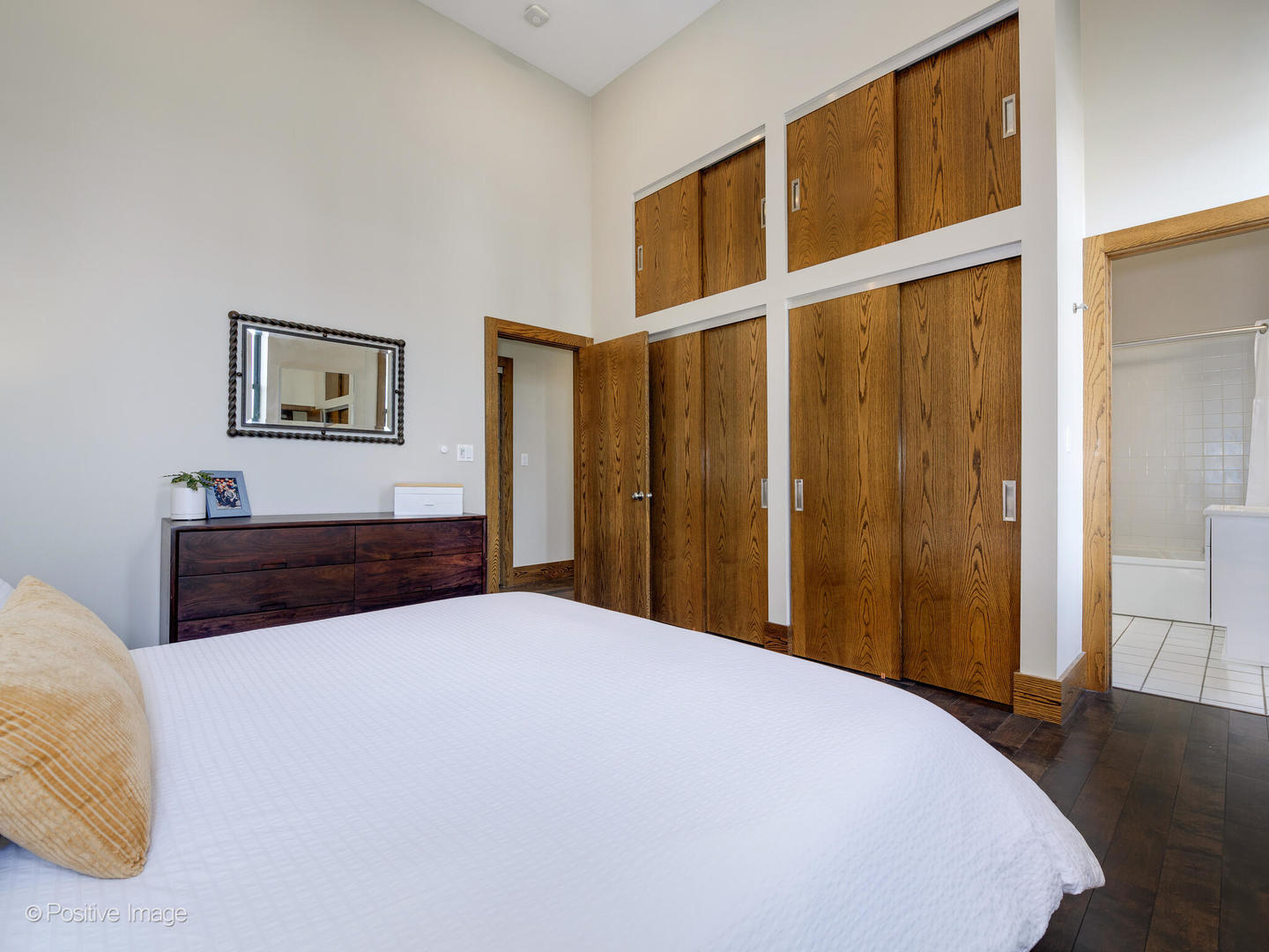 2543 North Racine Avenue, Unit 3N Chicago, IL 60614 - Photo 21 of 25 a bedroom with a bed and a window