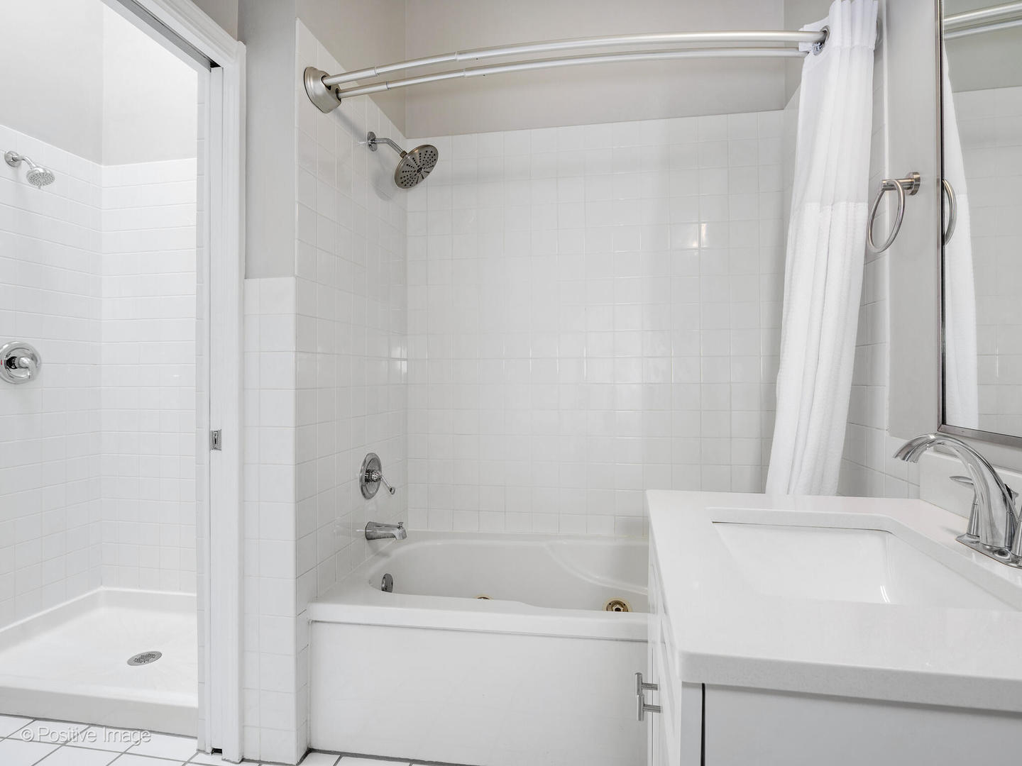 2543 North Racine Avenue, Unit 3N Chicago, IL 60614 - Photo 22 of 25 a bathroom with a sink and a shower