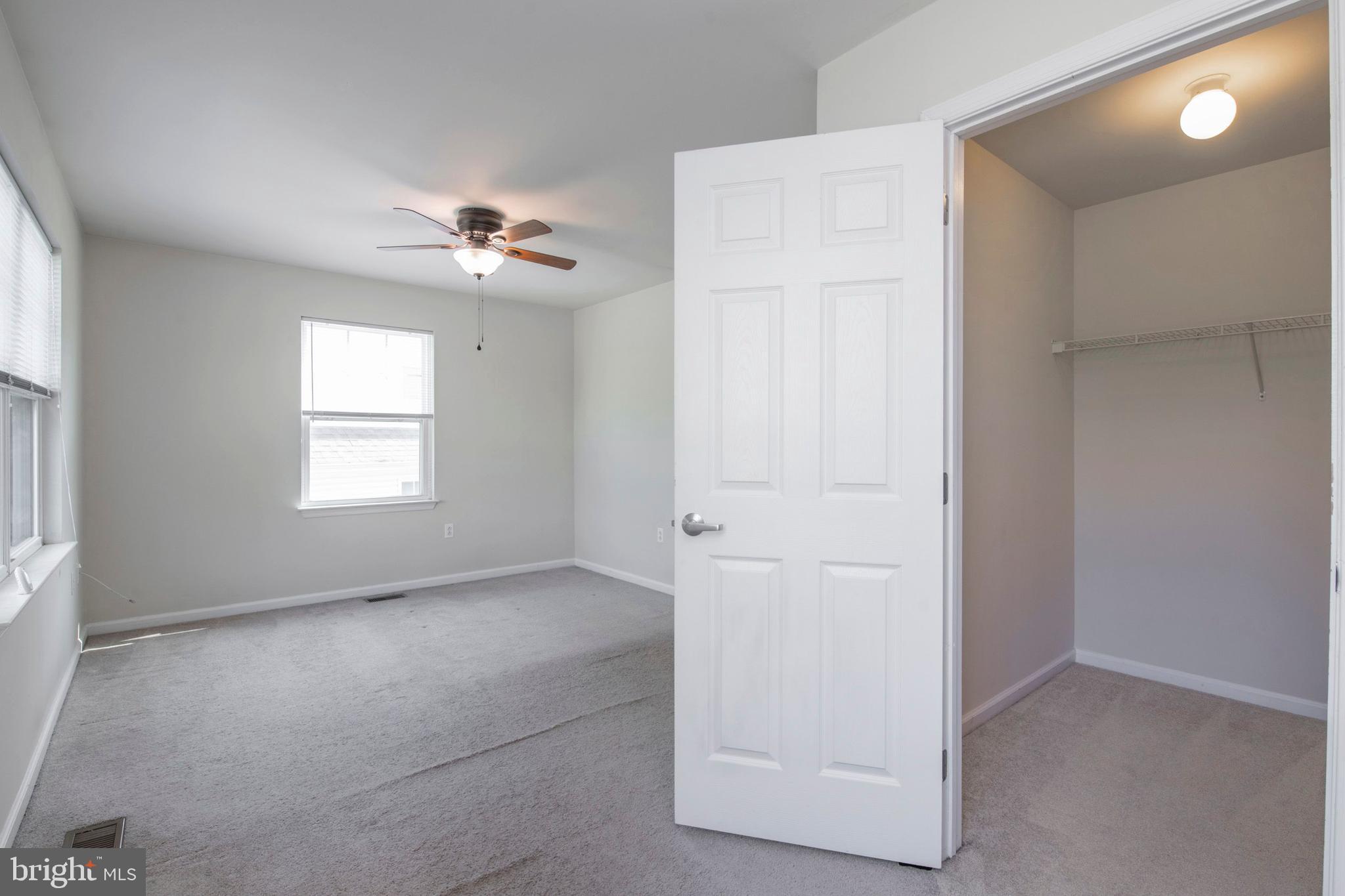 3718 Merrick Road Philadelphia, PA 19129 - Photo 22 of 44 Primary Bedroom w/ 2 closets/ Ceiling fan