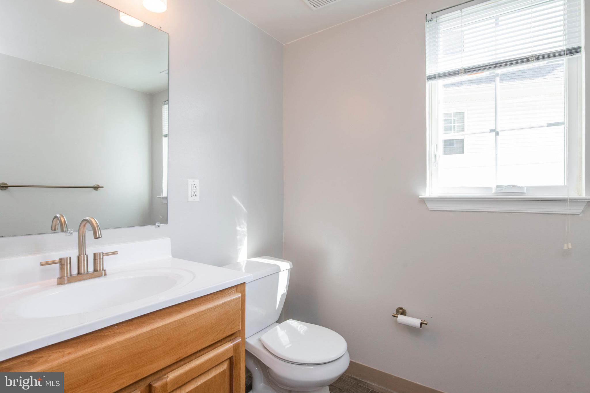 3718 Merrick Road Philadelphia, PA 19129 - Photo 9 of 44 Convenient 1st floor half bathroom