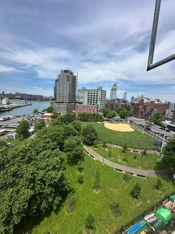 a view of a city with tall buildings