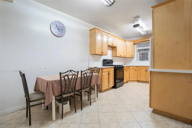 a view of kitchen with cabinets and wooden floor