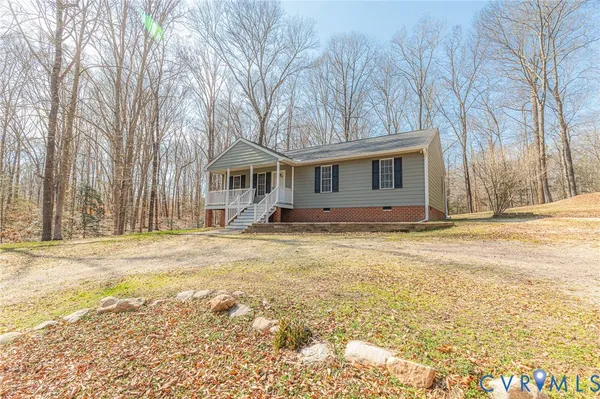 a front view of a house with a ocean view