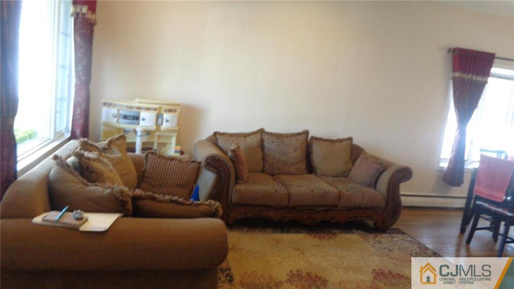 34 Brandywine Road Fords, NJ 08863 - Photo 3 of 19 a living room with furniture and a window