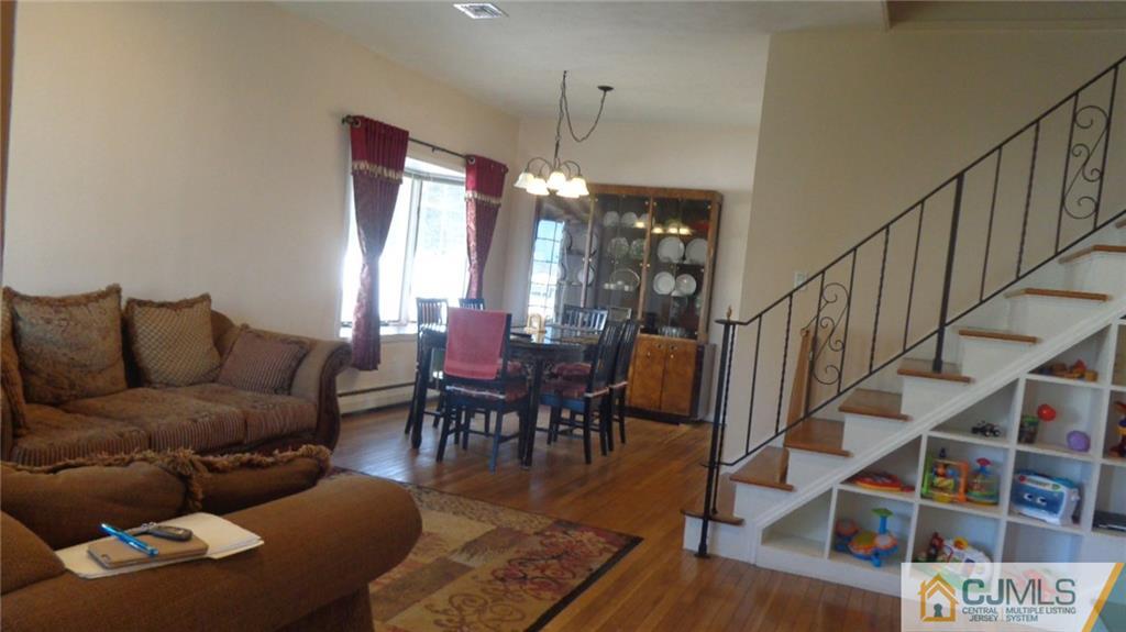 34 Brandywine Road Fords, NJ 08863 - Photo 4 of 19 a living room with furniture and wooden floor