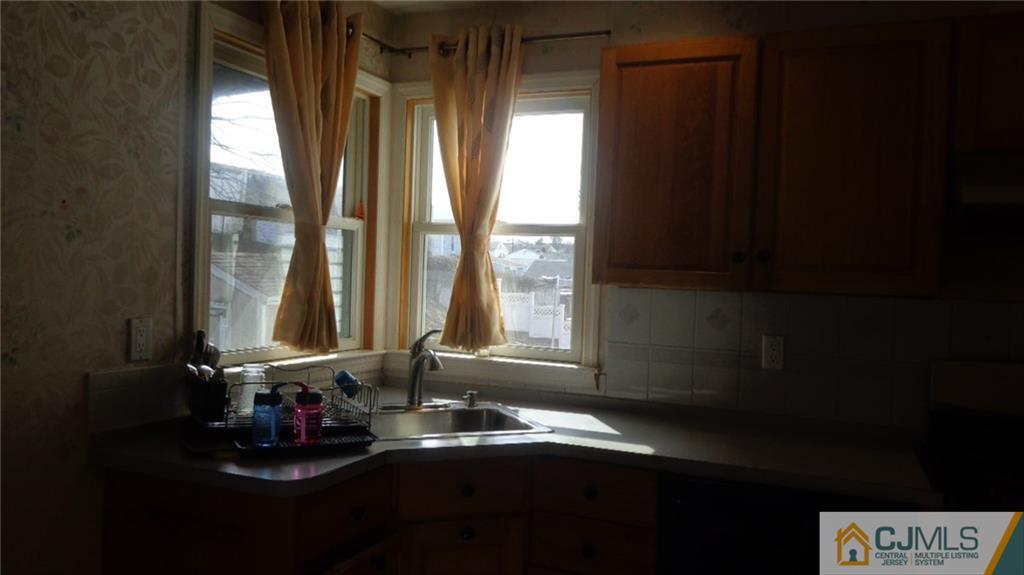 34 Brandywine Road Fords, NJ 08863 - Photo 8 of 19 a bathroom with a sink and a window