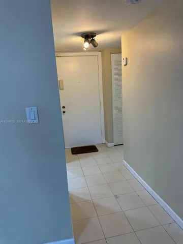 an empty room with a bathroom