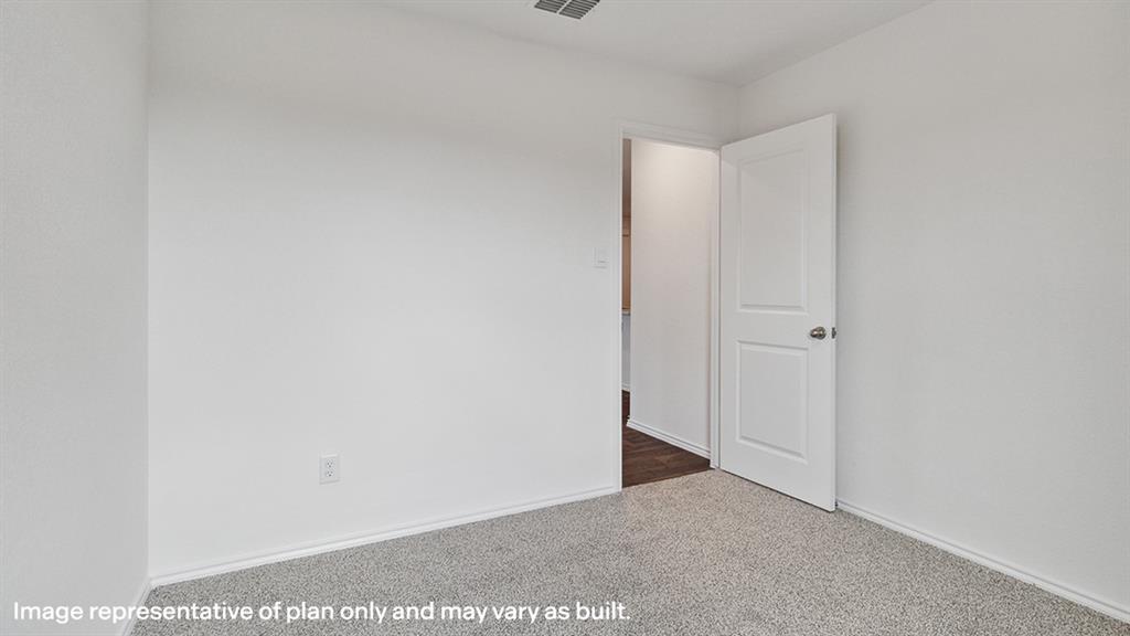 3522 Spring Time Street Forney, TX 75126 - Photo 26 of 27 Neutral wall paint with textured carpet flooring