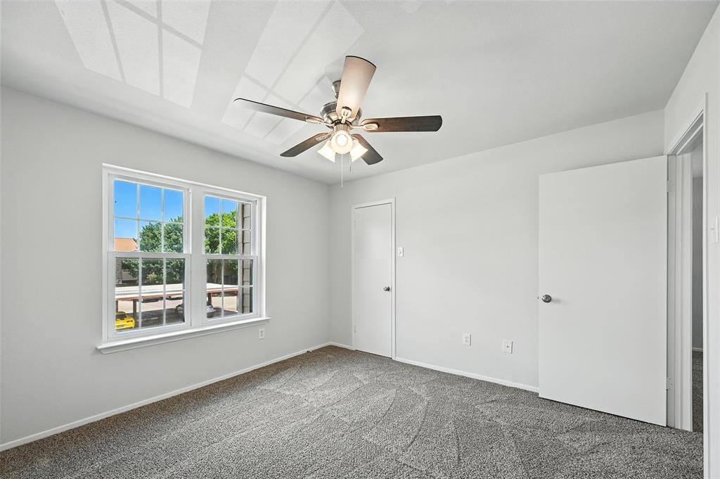 5626 Preston Oaks Road, Unit 22C Dallas, TX 75254 - Photo 26 of 29 a view of an empty room with a window