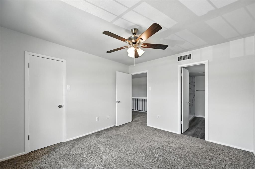 5626 Preston Oaks Road, Unit 22C Dallas, TX 75254 - Photo 27 of 29 a view of an empty room
