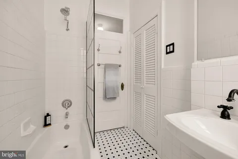 a view of a balcony with wooden floor and city view