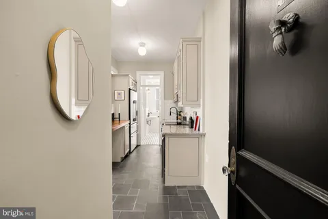 a very nice looking living room with a large window