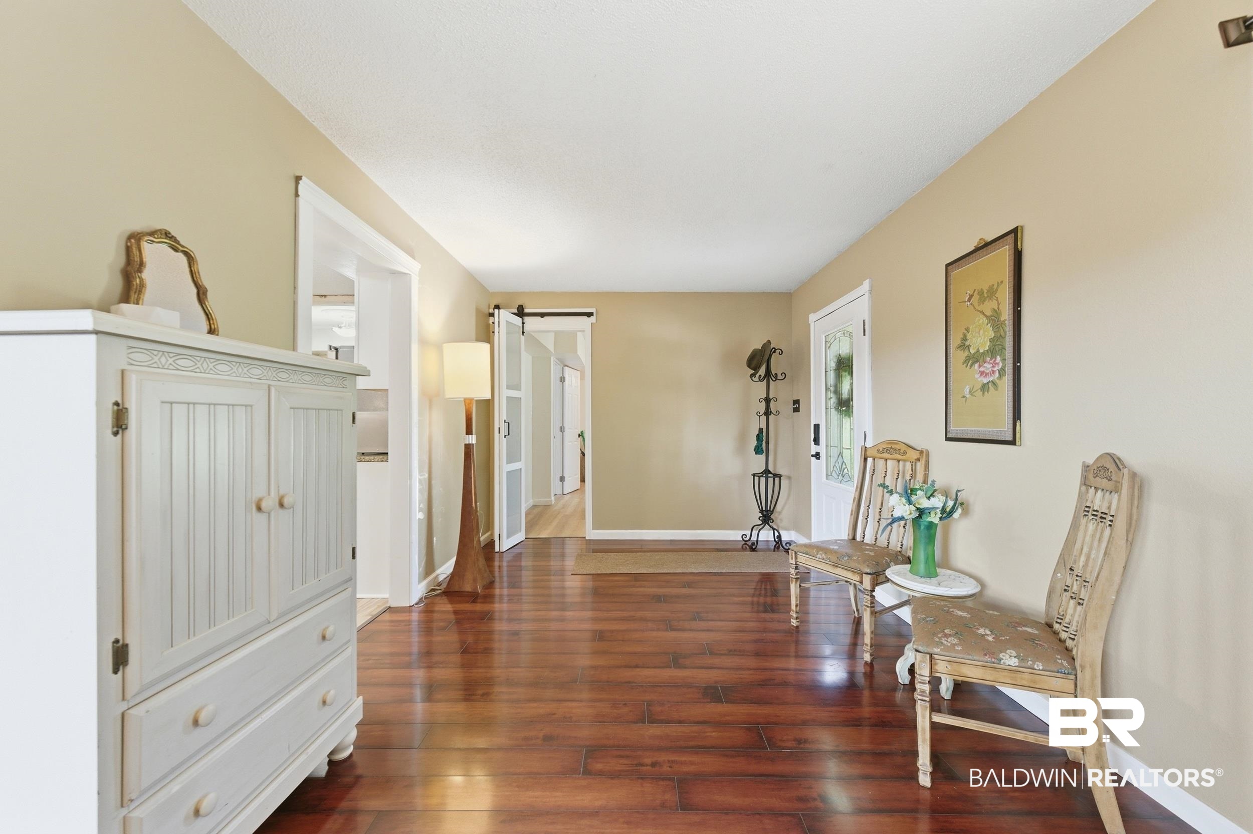 51620 Robert White Road Bay Minette, AL 36507 - Photo 10 of 81 Warm wood-finish flooring extends throughout the entry corridor
