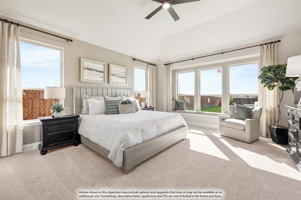 5418 Rutherford Drive Midlothian, TX 76065 - Photo 24 of 40 a spacious bedroom with a large bed and a large window