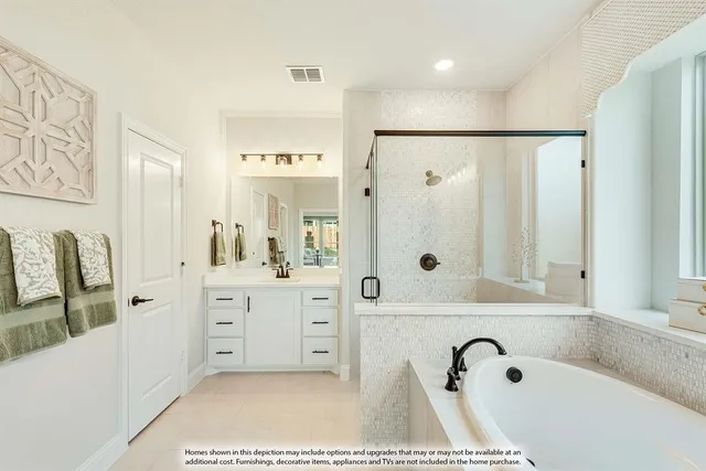a bathroom with a tub sink and mirror