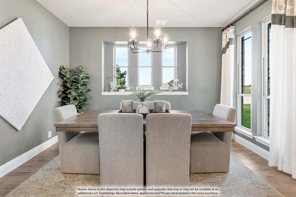 5418 Rutherford Drive Midlothian, TX 76065 - Photo 5 of 40 a living room with furniture and a chandelier