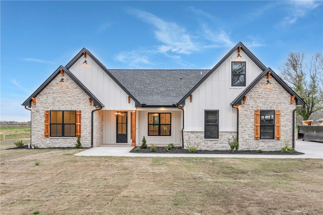 4554 Flat Rock Road Iva, SC 29655 - Photo 5 of 32 Stone and siding exterior creates a welcoming aesthetic on this modern farmhouse.