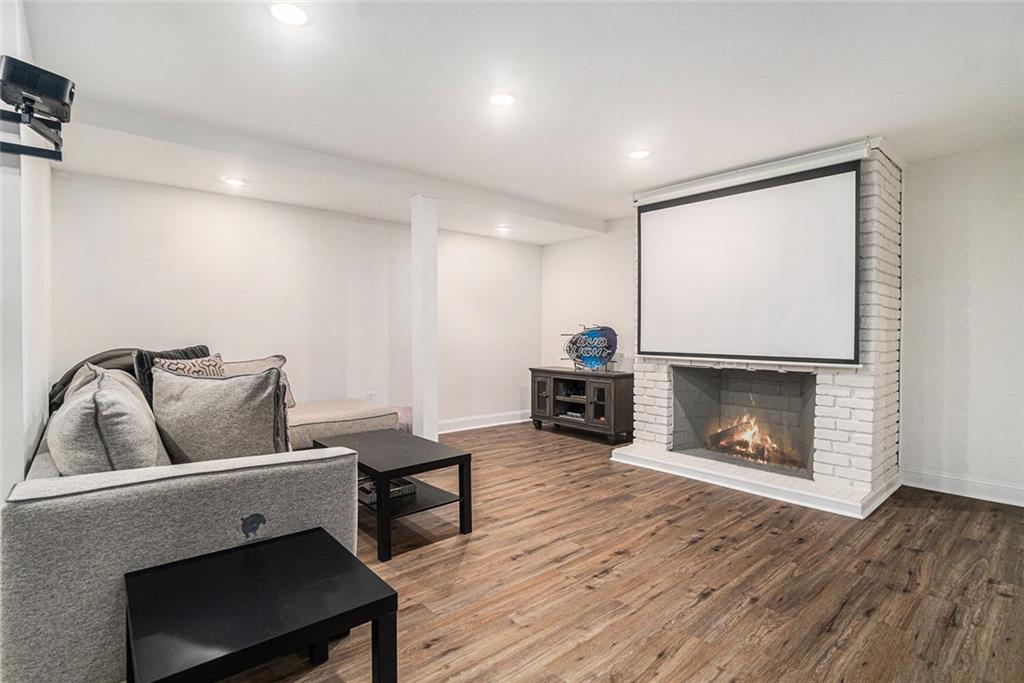2294 Collier Drive Decatur, GA 30032 - Photo 14 of 31 a living room with furniture and a fireplace