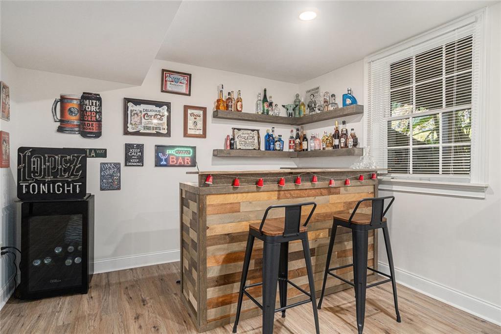 2294 Collier Drive Decatur, GA 30032 - Photo 16 of 31 a dining table with chairs and wooden floor