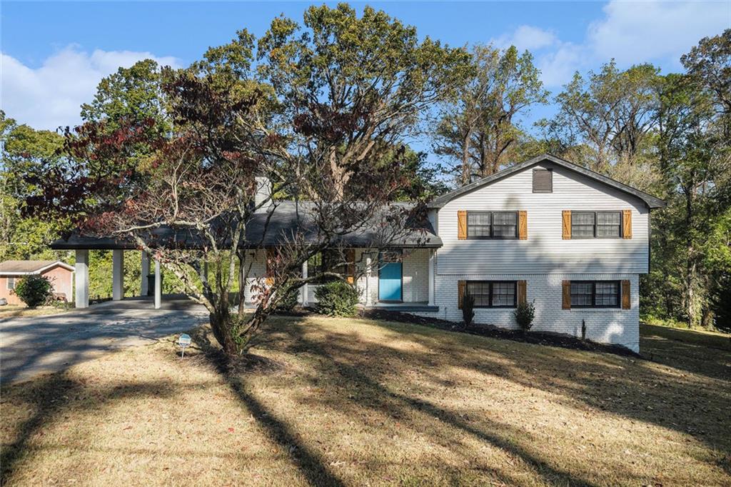 2294 Collier Drive Decatur, GA 30032 - Photo 2 of 31 a front view of a house with a yard