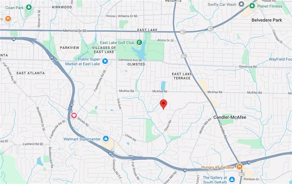 2294 Collier Drive Decatur, GA 30032 - Photo 31 of 31 a white and black white umbrella sitting next to a white wall